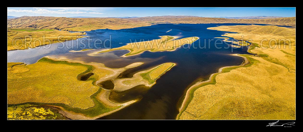 Image of Lake Onslow high in the Lammermoor Ranges. Formed in 1890 by damming of Teviot River and Dismal Swamp. Aerial panorama looking north, Roxburgh, Central Otago District, Otago Region, New Zealand (NZ) stock photo image