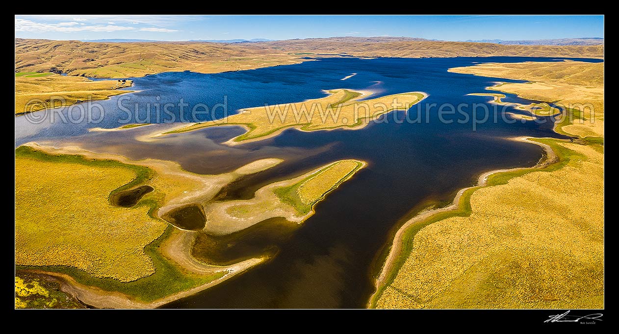 Image of Lake Onslow high in the Lammermoor Ranges. Formed in 1890 by damming of Teviot River and Dismal Swamp. Aerial panorama looking north, Roxburgh, Central Otago District, Otago Region, New Zealand (NZ) stock photo image