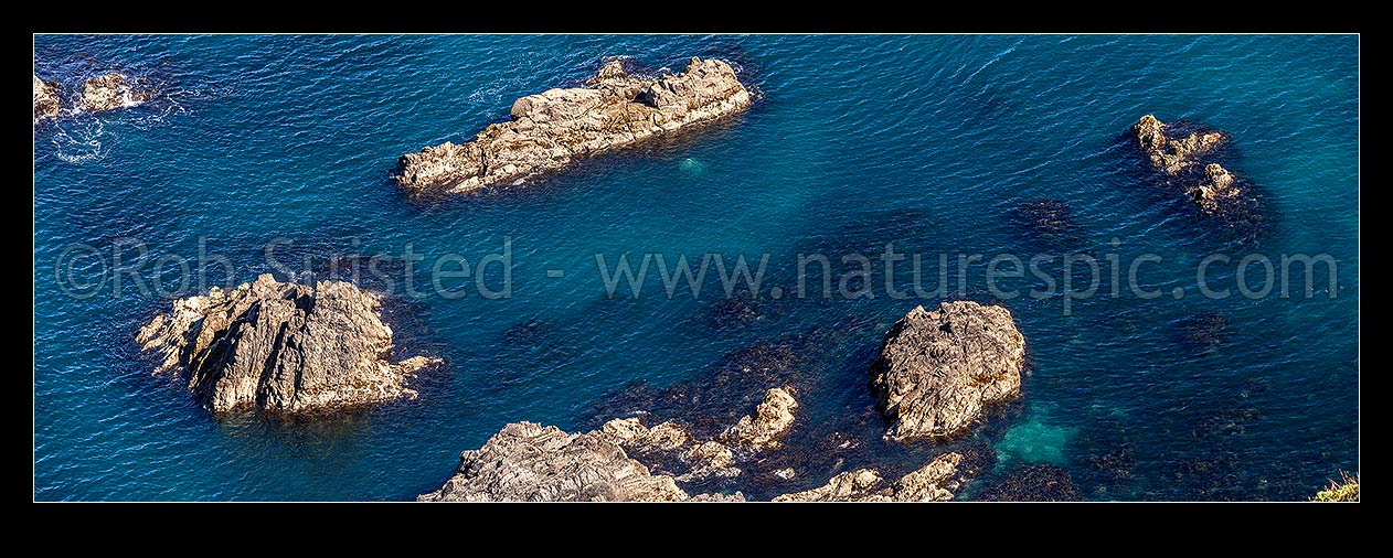 Image of Rocky shoreline with rocky reefs in nearshore coastline, Titahi Bay, Porirua City District, Wellington Region, New Zealand (NZ) stock photo image