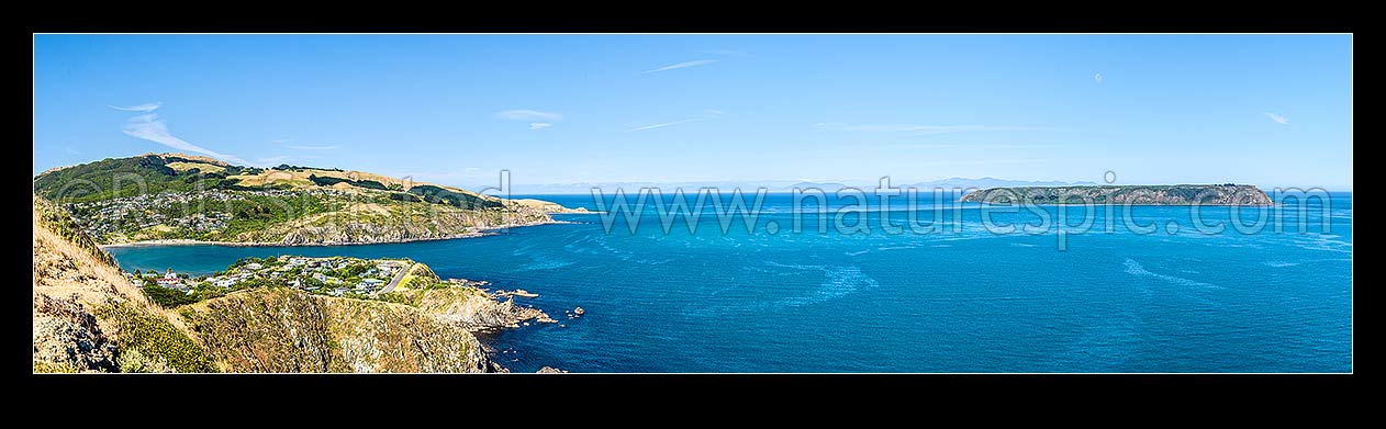 Image of Titahi Bay and Beach, looking across to Mana Island, with South Island behind across Cook Strait. Colonial Knob Scenic Reserve (468m) far left. Panorama, Titahi Bay, Porirua City District, Wellington Region, New Zealand (NZ) stock photo image