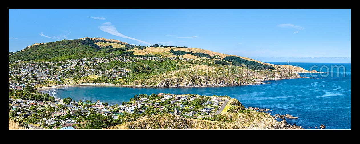 Image of Titahi Bay and beach. Colonial Knob Scenic Reserve (468m) far left. Panorama, Titahi Bay, Porirua City District, Wellington Region, New Zealand (NZ) stock photo image