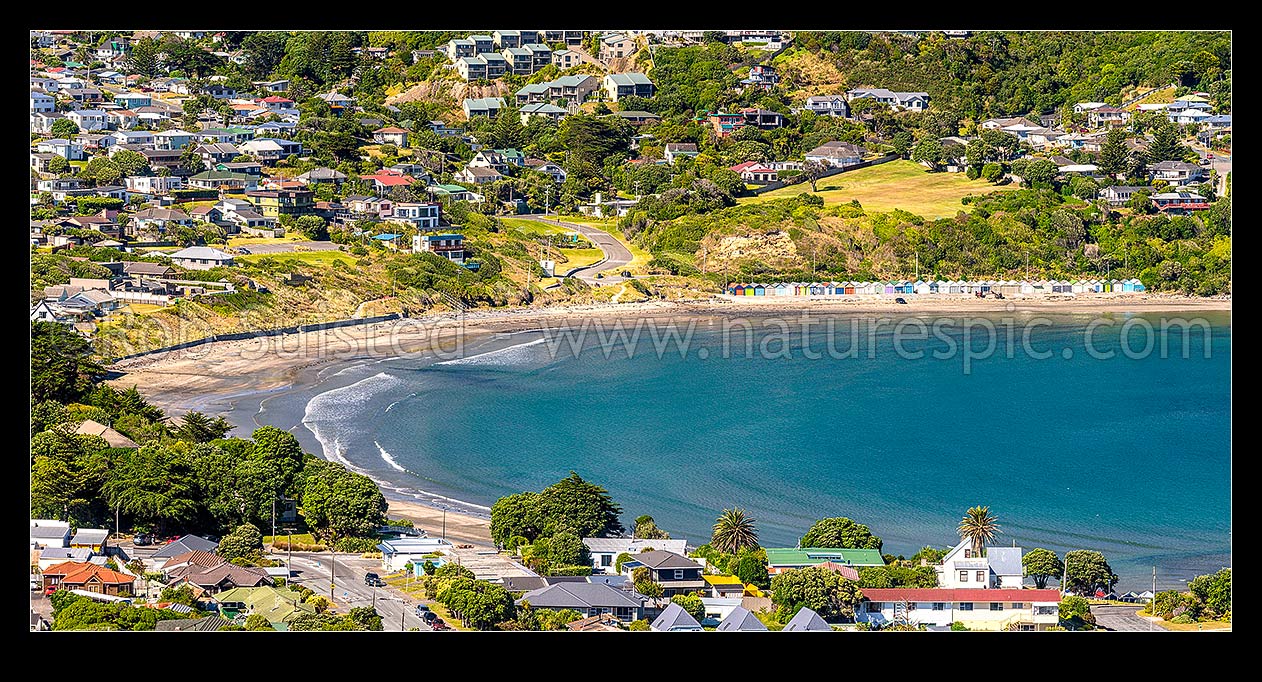 Image of Titahi Bay and Beach, with iconic boatsheds and homes visible. Panorama, Titahi Bay, Porirua City District, Wellington Region, New Zealand (NZ) stock photo image