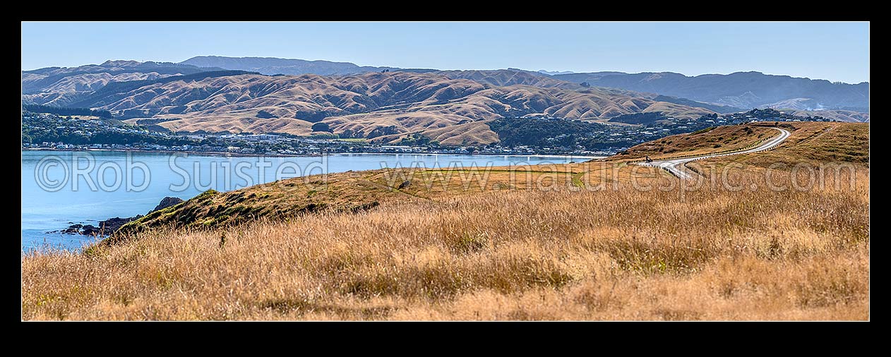 Image of Porirua Harbour entrance at Plimmerton, seen from Whitireia Park and Mt Cooper. Karehana Bay left, Plimmerton Beach centre. Panorama, Titahi Bay, Porirua City District, Wellington Region, New Zealand (NZ) stock photo image