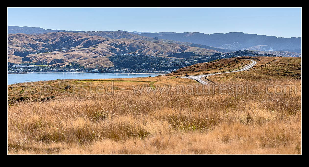 Image of Porirua Harbour entrance at Plimmerton, seen from Whitireia Park and Mt Cooper. Plimmerton Beach centre. Panorama, Titahi Bay, Porirua City District, Wellington Region, New Zealand (NZ) stock photo image