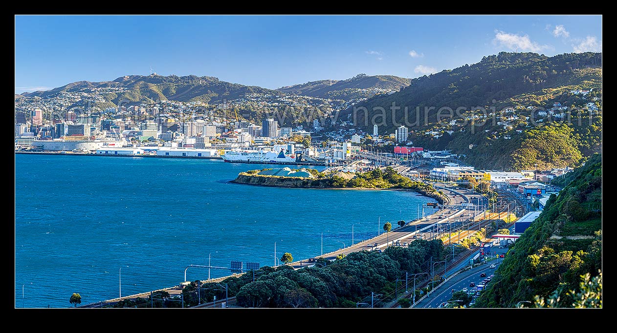 Image of Wellington City CBD, with SH1 motorway passing thru Kaiwharawhara and Thorndon. Brooklyn left, Tinakori centre, Wadestown suburb right. Panorama, Kaiwharawhara, Wellington City District, Wellington Region, New Zealand (NZ) stock photo image