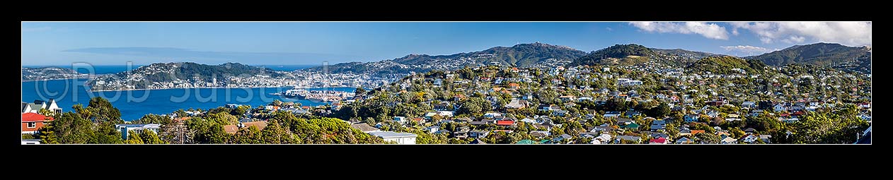 Image of Wellington City wide panorama of northern suburbs, looking over Khandallah houses towards harbour. Ngaio far right, Kaiwharawhara, Wellington City District, Wellington Region, New Zealand (NZ) stock photo image