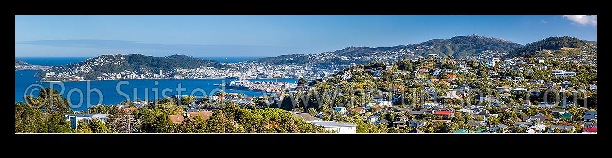 Image of Wellington wide panorama from northern suburbs, looking over Khandallah houses towards harbour and city, Kaiwharawhara, Wellington City District, Wellington Region, New Zealand (NZ) stock photo image