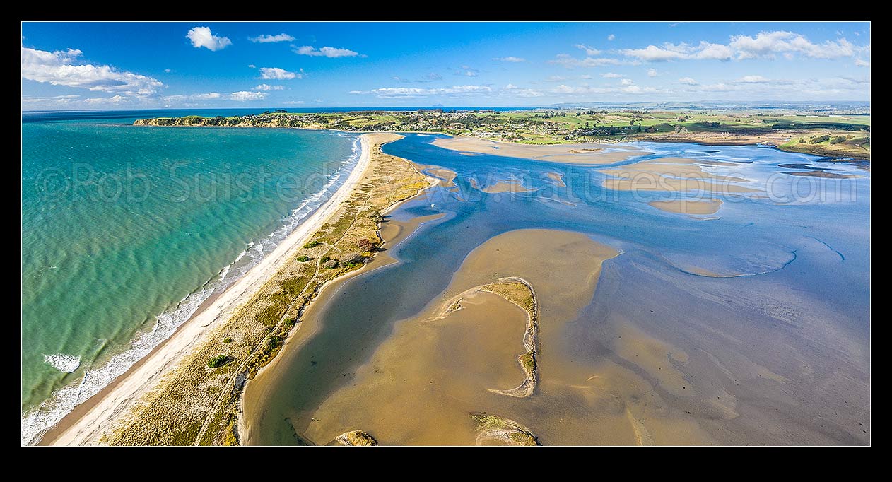 Image of Maketu Estuary and Kaituna River mouth (top centre) looking towards Maketu township. Aerial view, Maketu, Western Bay of Plenty District, Bay of Plenty Region, New Zealand (NZ) stock photo image