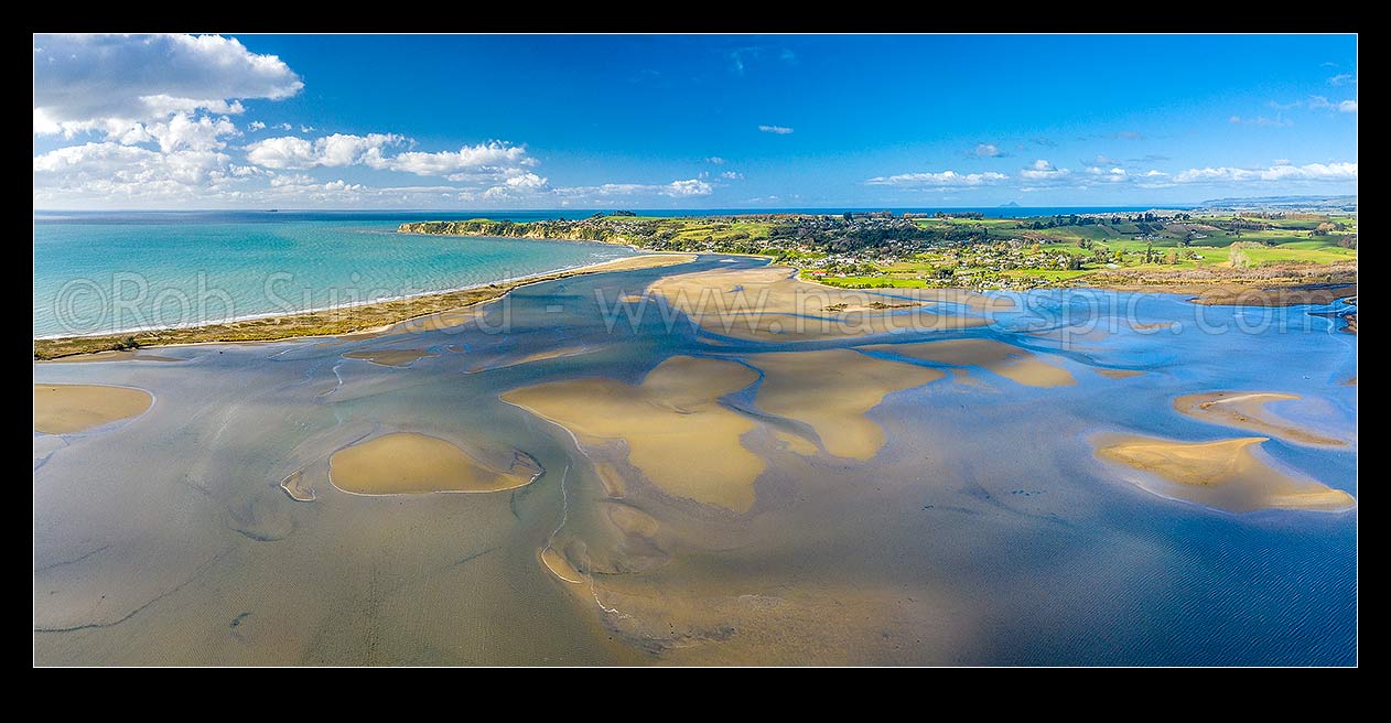 Image of Maketu Estuary and Kaituna River mouth (top centre) looking towards Maketu township. Aerial panorama, Maketu, Western Bay of Plenty District, Bay of Plenty Region, New Zealand (NZ) stock photo image