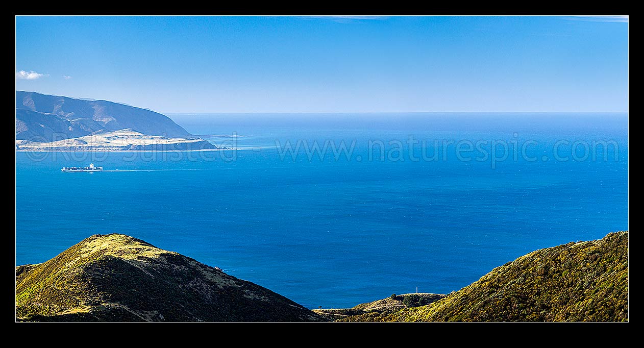 Image of Cook Strait looking south from Wellington's South Coast towards Baring Head at Harbour entrance. Panorama, Owhiro Bay, Wellington City District, Wellington Region, New Zealand (NZ) stock photo image