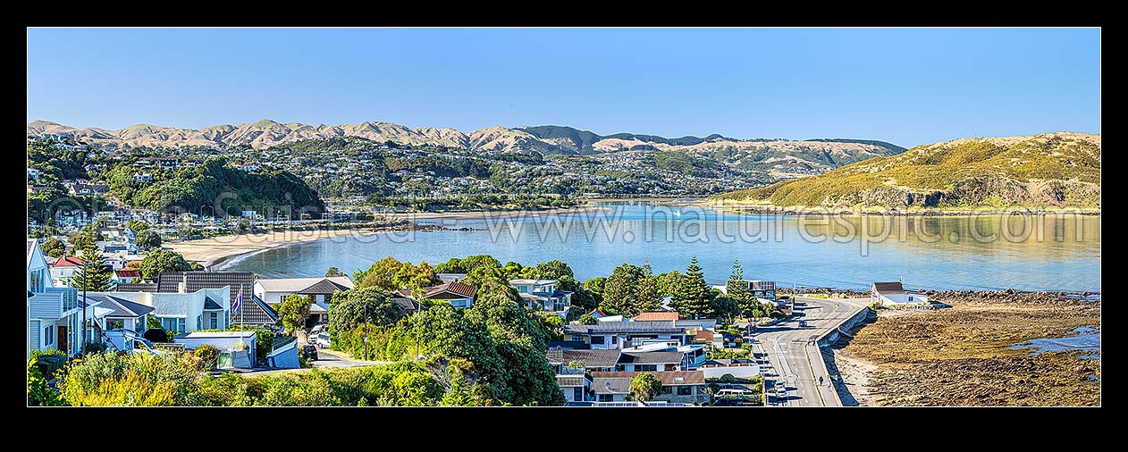 Image of Plimmerton Beach panorama, looking south past Mana and Paremate into Porirua Harbour. Titahi Bay at right, Plimmerton, Porirua City District, Wellington Region, New Zealand (NZ) stock photo image