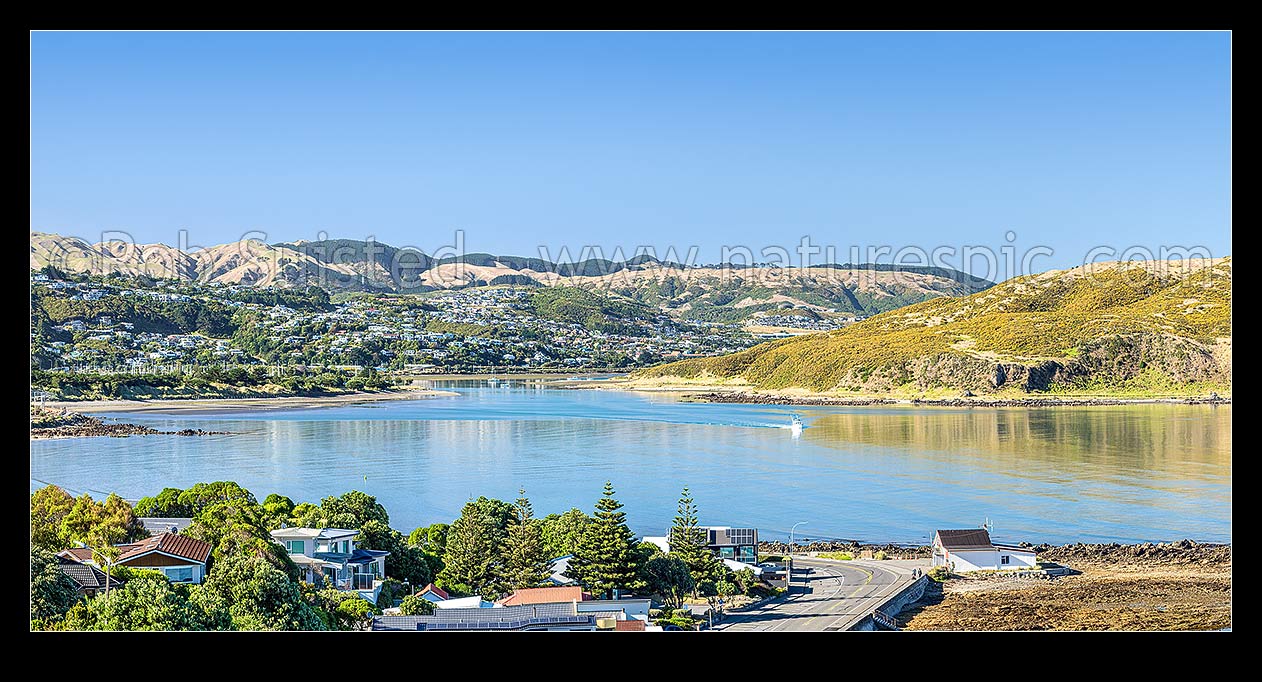 Image of Porirua Harbour entrance at Plimmerton, looking south to Paremata, Papakowhai and Aotea. Titahi Bay and Whitireia Park right. Panorama, Plimmerton, Porirua City District, Wellington Region, New Zealand (NZ) stock photo image