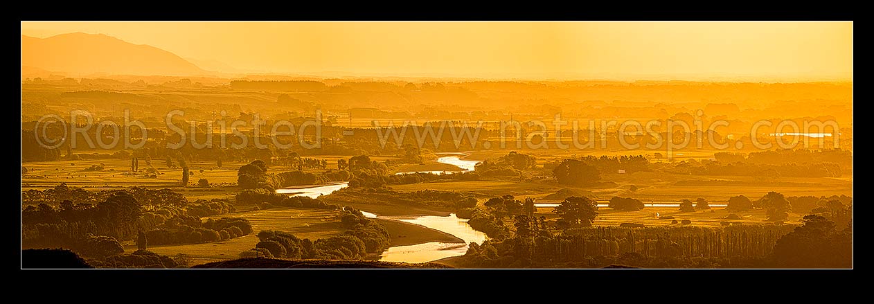 Image of Manawatu River winding through rural farmland near Palmerston North. Evening panorama, Ashhurst, Palmerston North City District, Manawatu-Wanganui Region, New Zealand (NZ) stock photo image