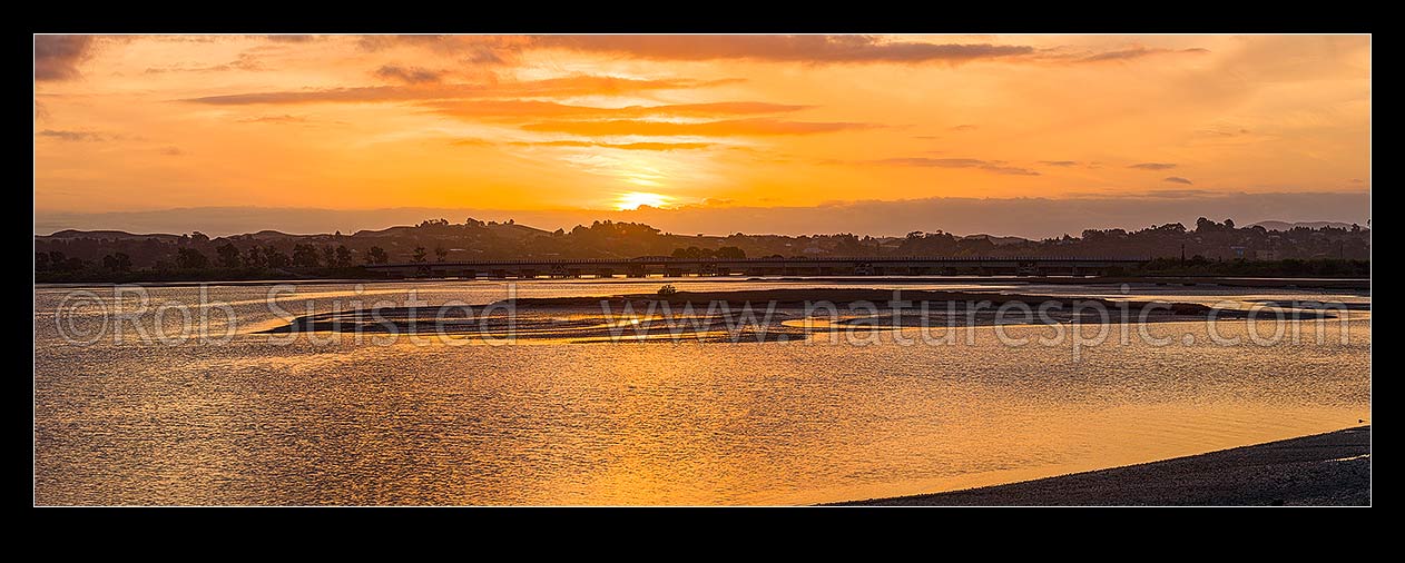 Image of Ahuriri Estuary Conservation Area sunset over the tidal wetland and saltmarshes at Westshore. Panorama, Napier, Napier City District, Hawke's Bay Region, New Zealand (NZ) stock photo image