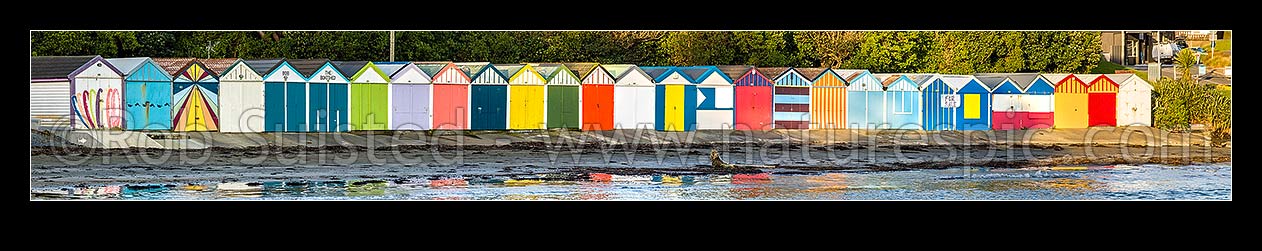 Image of Titahi Bay Beach boat sheds, a colourful brightly painted iconic feature of the bay. Panorama, Titahi Bay, Porirua City District, Wellington Region, New Zealand (NZ) stock photo image