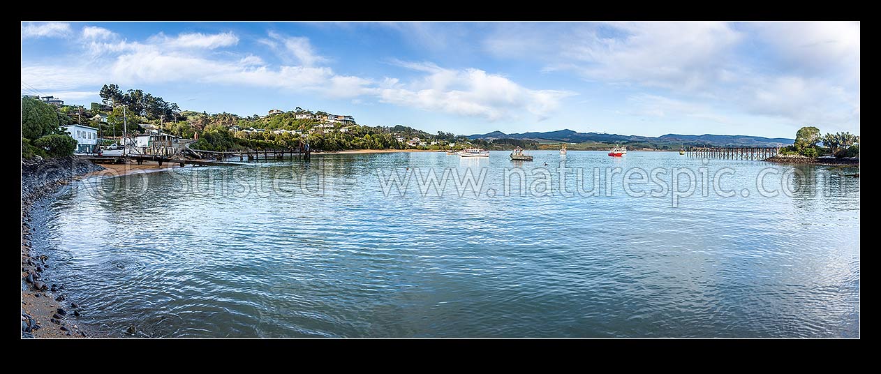 Image of Moeraki fishing fleet vessels moored in Onekakara Bay on a calm morning. Panorama, Moeraki, Waitaki District, Canterbury Region, New Zealand (NZ) stock photo image