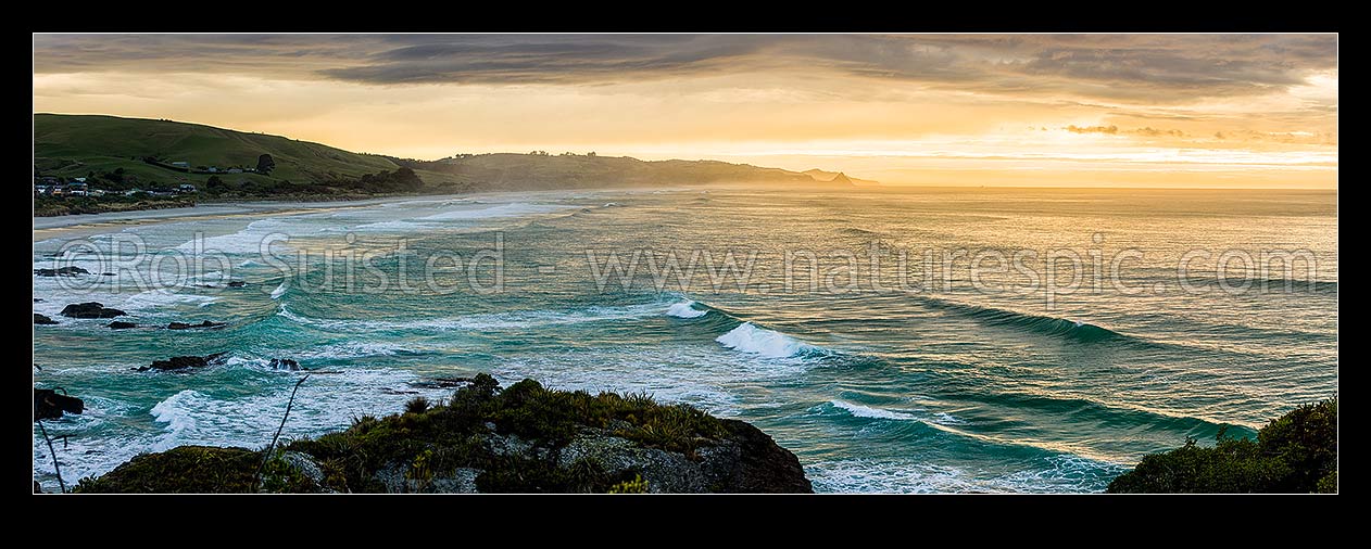 Image of Brighton Beach, Waldron foreshore and Kaikorai Stream mouth on a moody sunrise. Blackhead point and Otago Peninsula beyond. Panorama, Brighton, Dunedin City District, Otago Region, New Zealand (NZ) stock photo image