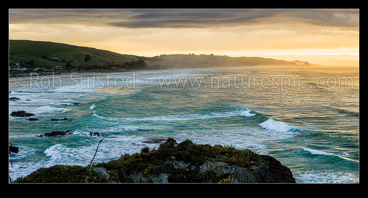 Image of Brighton Beach, Waldron foreshore and Kaikorai Stream mouth on a moody sunrise. Blackhead point and Otago Peninsula beyond. Panorama, Brighton, Dunedin City District, Otago Region, New Zealand (NZ) stock photo image