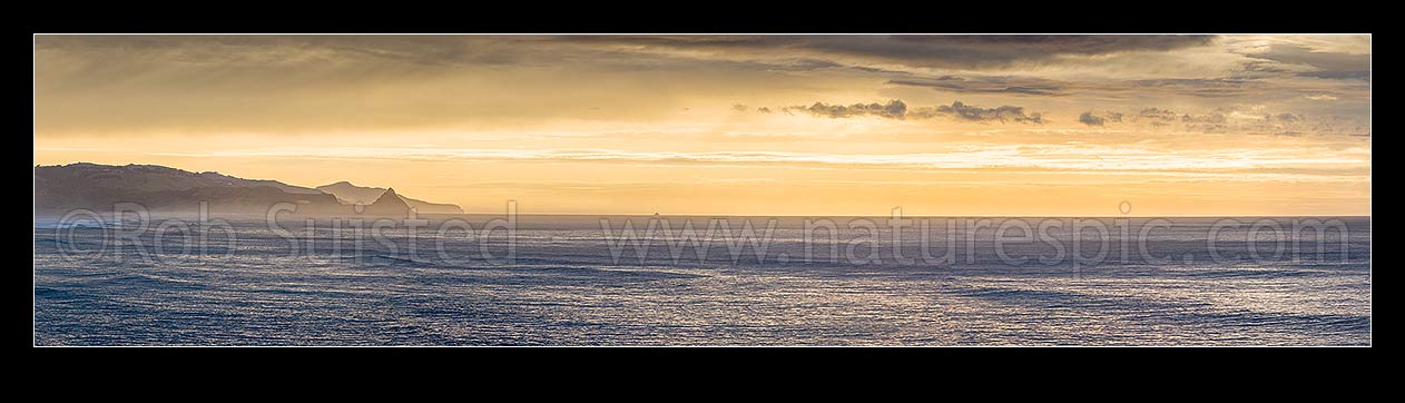 Image of Otago Peninsula dawn from Brighton Beach, looking past Back Head point and White Island (centre) towards Otago Peninsula beyond. Panorama, Brighton, Dunedin City District, Otago Region, New Zealand (NZ) stock photo image