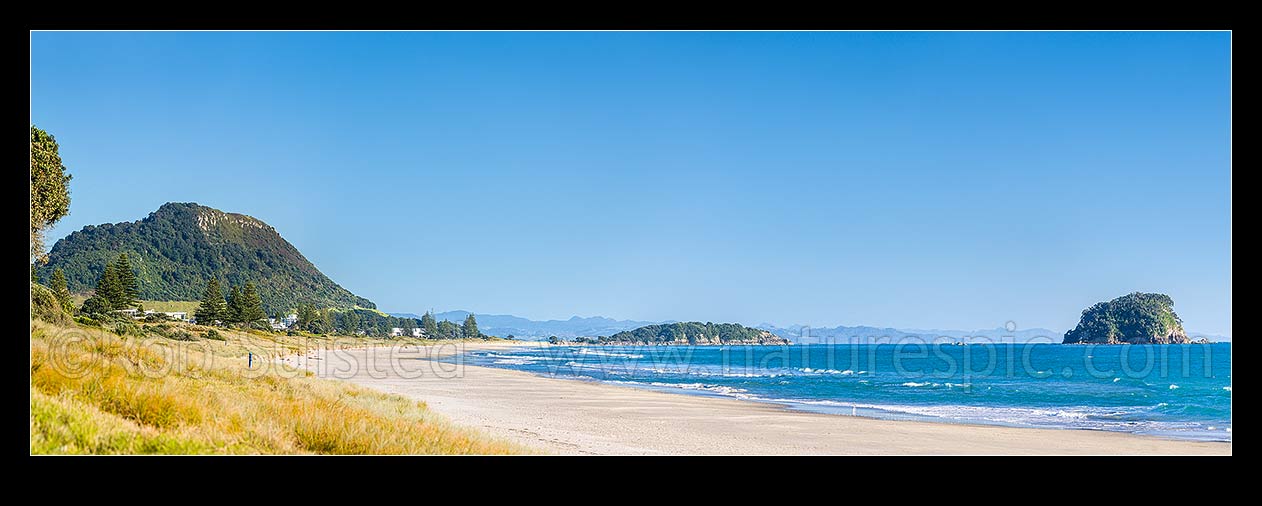 Image of Papamoa Beach on a summer day, looking west towards Mt Maunganui Mauao and Motuotau Island. Panorama, Papamoa Beach, Tauranga District, Bay of Plenty Region, New Zealand (NZ) stock photo image