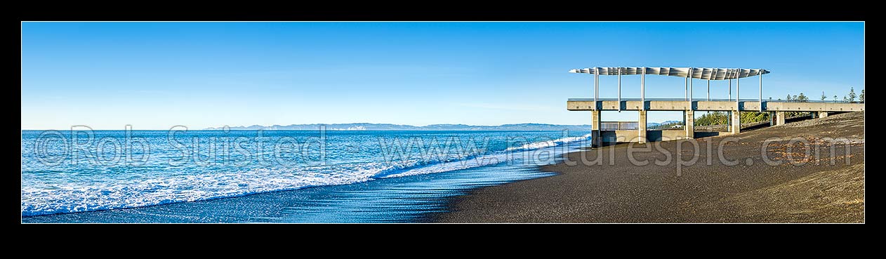 Image of Napier foreshore with viewing platform and marine outfall in early morning light. Clifton and Cape Kidnappers coast beyond. Panorama, Napier, Napier City District, Hawke's Bay Region, New Zealand (NZ) stock photo image