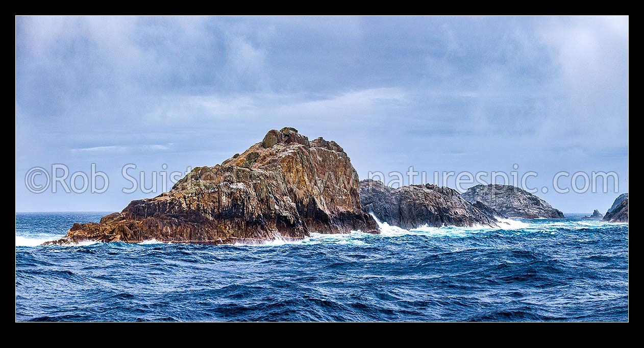 Image of Bounty Islands main group panorama from the east. Lion Island (left), Ruatara Is (behind), Dog Rock (in gap), Ranfurly Island far right. Moutere Hauriri, Bounty Islands, NZ Sub Antarctic District, NZ Sub Antarctic Region, New Zealand (NZ) stock photo image