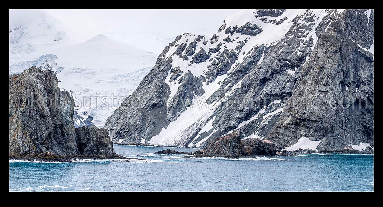 Image of Point Wild on Elephant Island, where Shackleton's men stayed for 128 days (centre). Ice-covered mountainous island in outer reaches of South Shetland Islands. Panorama, Elephant Island, Antarctica Region, Antarctica stock photo image