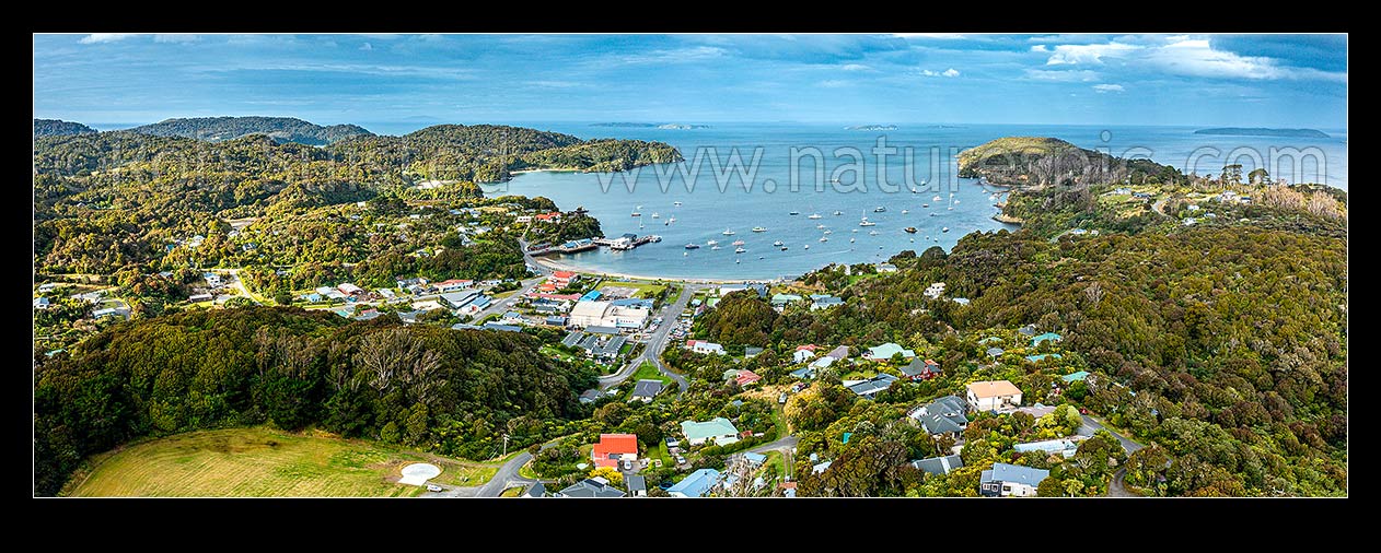 Image of Halfmoon Bay (Oban) the main centre on Rakiura Stewart Island. Aerial panorama view, Halfmoon Bay, Stewart Island District, Southland Region, New Zealand (NZ) stock photo image